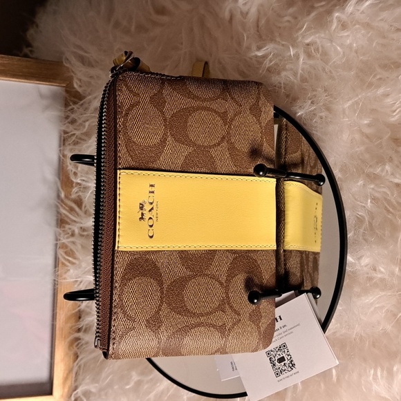 Coach NWTs Signature PVC Corner Zip Wristlet